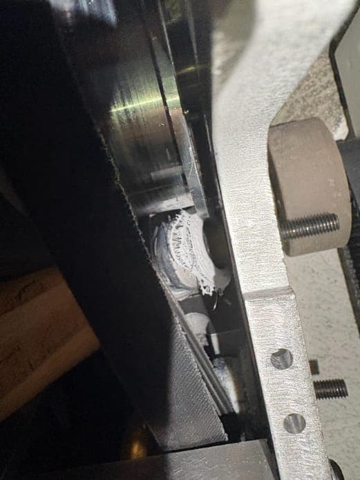 Weapon side plate and screws during assembly