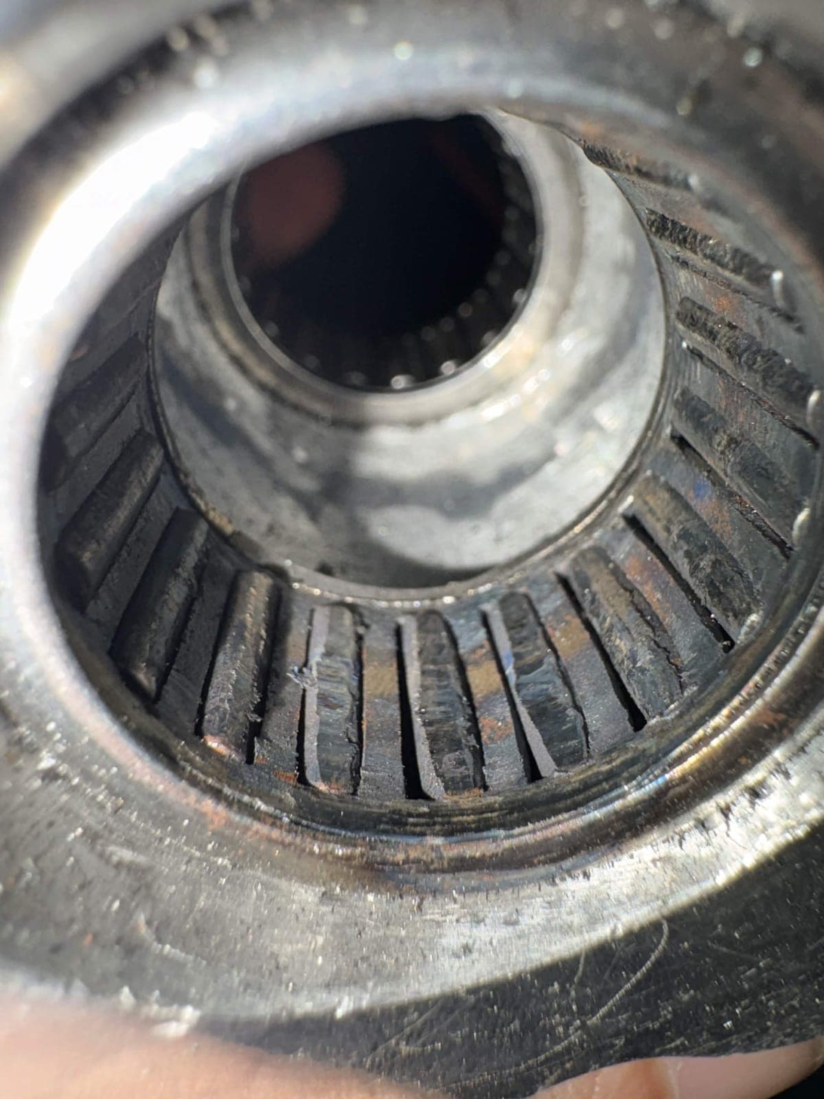Flattened needle bearing from the weapon, first view